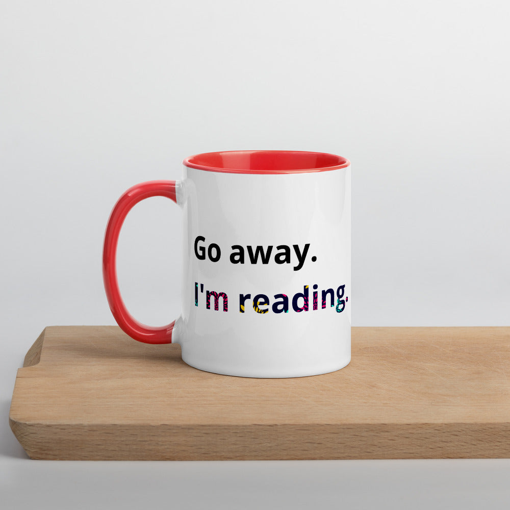 Go away I'm reading Ceramic Mug