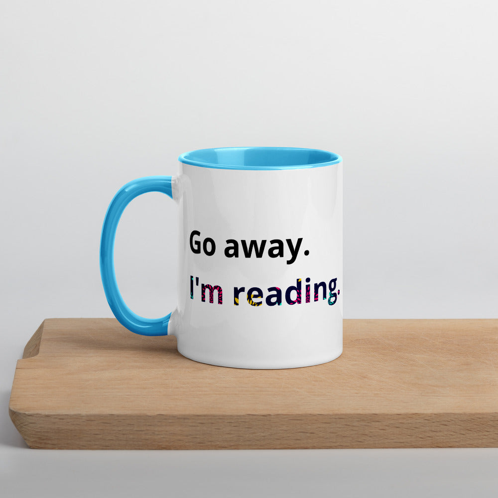 Go away I'm reading Ceramic Mug